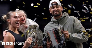 Aryna Sabalenka and Nick Kyrgios hug at the net