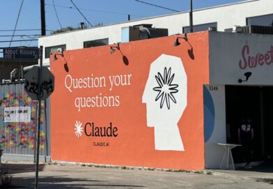 Claude ad on side of building