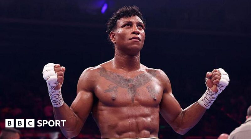 Bilal Fawaz extends his hands in celebration after his win over Junaid Bostan