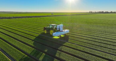 Carbon Robotics' LaserWeeder machine operating a in a field.