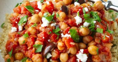 Chickpea stew with tomatoes, olives and quinoa in a bowl.