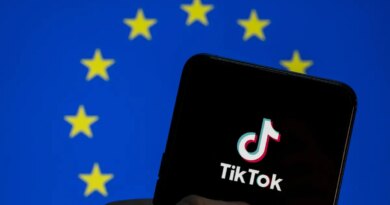 TikTok logo seen on an Android mobile device screen with the European Union (EU) flag in the background.