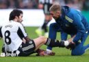 Newcastle midfielder Sandro Tonali gets treatment for an injury during the Premier League game against Aston Villa