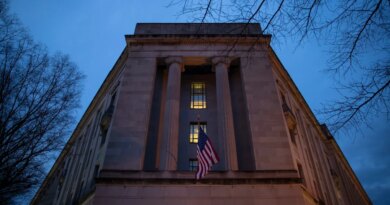 Department of Justice stands in the early hours of Friday morning, March 22, 2019 in Washington, DC.