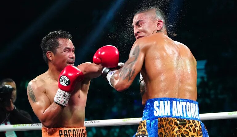 Jul 19, 2025; Las Vegas, Nevada, USA; Manny Pacquiao fights Mario Barrios at MGM Grand Garden Arena. Mandatory Credit: Stephen R. Sylvanie-Imagn Images