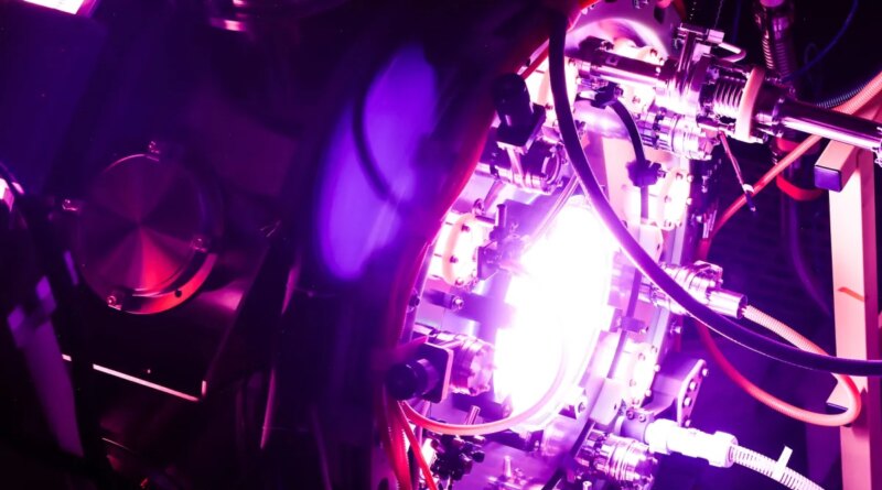 A fusion reactor glows purple.
