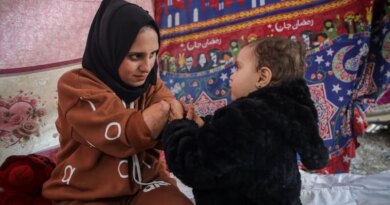 Nebal with her two-year-old daughter, Rita [Abdelhakim Abu Riash/ Al Jazeera]