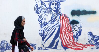 Iran says ready for talks but will defend itself against US aggression
