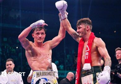 Josh Warrington holds up Leigh Wood's hand