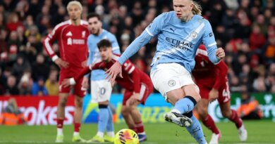 Man City fight back to win 2-1 at Liverpool and keep title hopes alive
