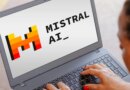 The Mistral AI logo is seen displayed on a laptop screen.