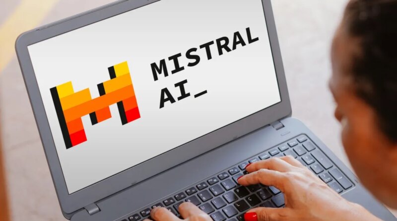 The Mistral AI logo is seen displayed on a laptop screen.