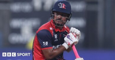Nepal's players do a lap of honour