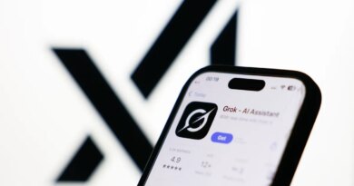 xAI logo displayed on a screen and Grok on App Store displayed on a phone screen