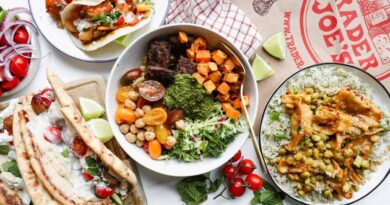 Assorted dishes with tacos, naan wraps, rice with vegetables, a grain bowl with sweet potatoes and greens, and a Trader Joe