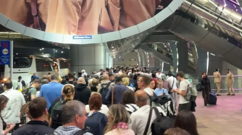 Passengers evacuated from Dubai International Airport after suspected air strike damages terminal