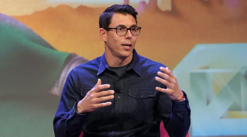 Rivian CEO says it may be 'inconceivable' to buy a car that can't drive itself by 2030