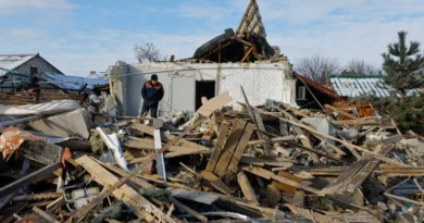 Members of Russia's emergencies ministry work on the ruins of a house, which was destroyed during what Russian-installed authorities called a recent Ukrainian drone attack, in the course of Russia-Ukraine conflict in the settlement of Sartana in the Donetsk region, a Russian-controlled area of Ukraine, February 1, 2026. REUTERS/Alexander Ermochenko