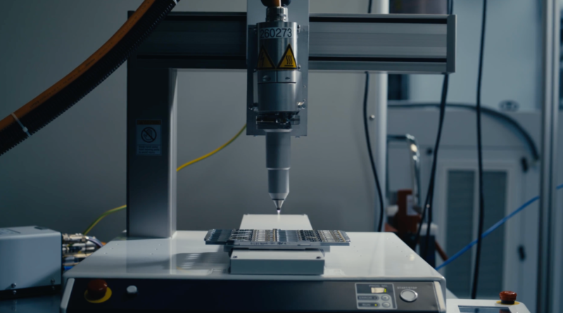 An image of automated manufacturing equipment.