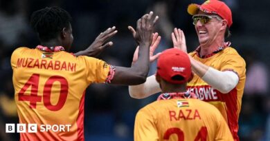 Zimbabwe's Blessing Muzarabani celebrates taking the wicket of Australia's Josh Inglis with his team-mates