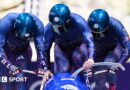 Team GB push the sled in the first heat of the bobsleigh at Cortina sliding centre