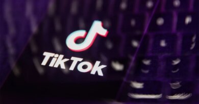 A laptop keyboard and TikTok logo displayed on a phone screen are seen in this multiple exposure illustration.