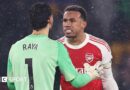 Arsenal keeper David Raya and defender Gabriel in a heated exchange after their misunderstanding led to Wolves securing a late equaliser.