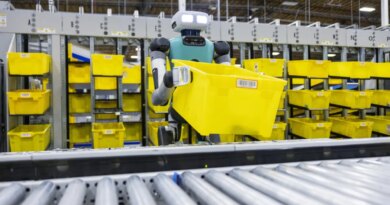 A Digit robot works in an Amazon distribution center.