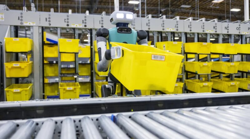 A Digit robot works in an Amazon distribution center.