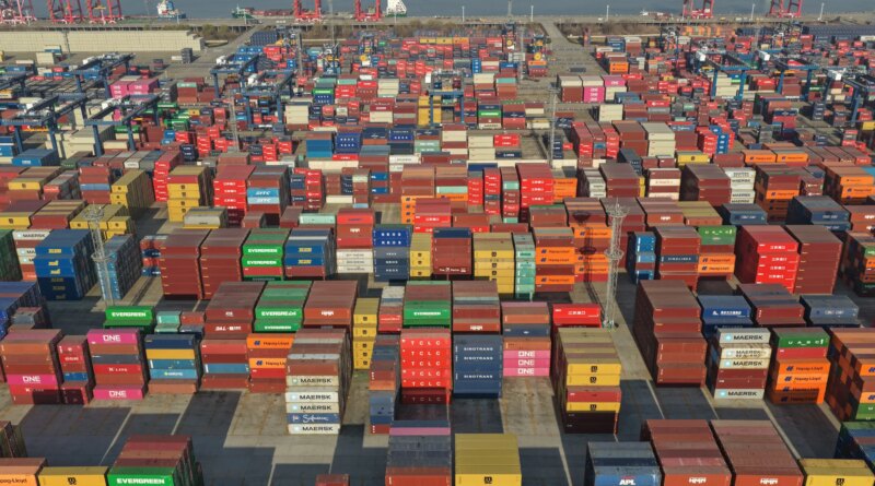 US trade deficit swells in December as imports surge