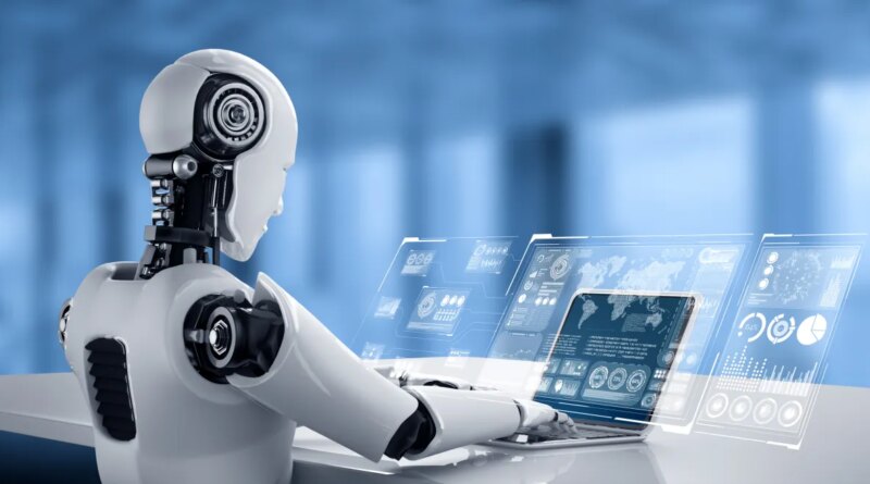 Robot humanoid uses laptop