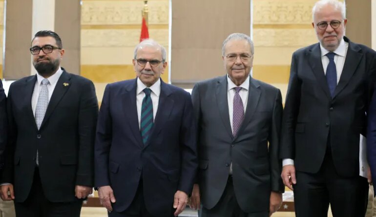 Syrian Justice Minister of the caretaker government Mazhar Al Wais (L), Lebanese Prime Minister Nawaf Salam (2-L), Lebanese Deputy Prime Minister Tarek Mitri (2-R), and Lebanese Justice Minister Adel Nassar (R) pose for a photograph before the signing of a historic judicial agreement at the Government Palace in Beirut, Lebanon, 06 February 2026. Lebanon and Syria signed a historic judicial agreement allowing convicted inmates to be transferred from the country where their sentence was issued to their country of nationality. This marks a significant step in judicial cooperation between the two neighbors. The agreement applies to hundreds of Syrian detainees currently held in Lebanese prisons, with the initial implementation set to transfer approximately 300 Syrian prisoners to Syria. EPA/WAEL HAMZEH