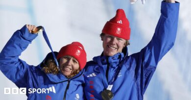 Charlotte Bankes and Huw Nightingale on the podium