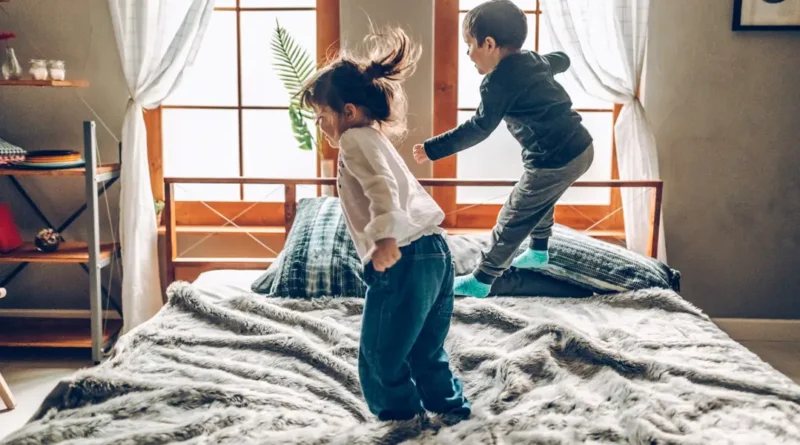 2 kids, 2 adults, 1 queen bed, and no personal space. I regret not splurging on a king-size mattress while my kids were little.