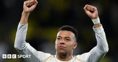 An AI-generated image of Kylian Mbappe skiing while holding his turtle