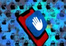 an illustration of a blue Lockdown Mode icon on a red phone on a blue background featuring Apple logos with padlocks.
