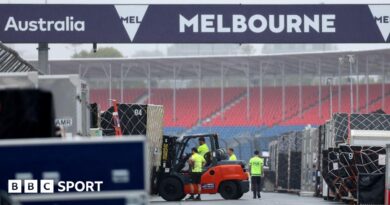Workers prepare for the 2026 Australian Grand Prix