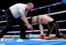 Phil Edwards counts a knocked down Lee Clayton during a boxing match