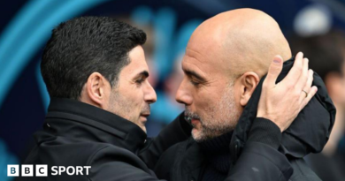 Arsenal manager Mikel Arteta embracing Manchester City boss Pep Guardiola