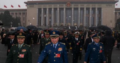 Members of the Chinese People's Liberation Army (PLA) leave the Great Hall of the People amid snowfall on Tiananmen Square, before the opening sessions of the annual Chinese People's Political Consultative Conference (CPPCC) and National People's Congress (NPC), in Beijing, China, March 4, 2026. REUTERS/Tingshu Wang