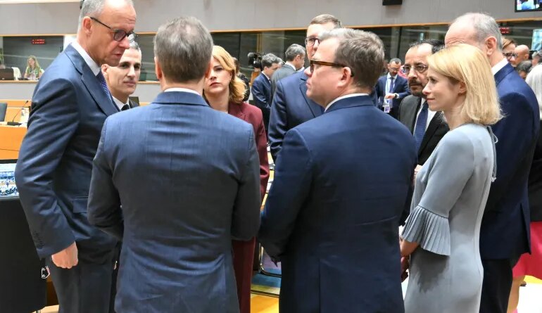 Germany's Chancellor Friedrich Merz (L) speaks with (from L) Bulgaria Caretaker Prime Minister Andrey Gurov, Latvia's Prime Minister Evika Silina, Estonia's Prime Minister Kristen Michal, Finland's Prime Minister Petteri Orpo, Cyprus' President Nikos Christodoulides and EU High Representative and Vice-President for Foreign Affairs and Security Policy Kaja Kallas ahead of rountable during the EU Summit at the EU headquarters in Brussels, on March 19, 2026.