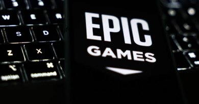 A laptop keyboard and Epic Games logo displayed on a phone screen are seen in this illustration photo taken in Krakow, Poland on October 1, 2024. (Photo by Jakub Porzycki/NurPhoto via Getty Images)