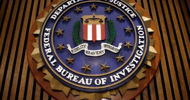 The seal of the F.B.I. hangs in the Flag Room at the bureau's headquaters March 9, 2007 in Washington, DC.