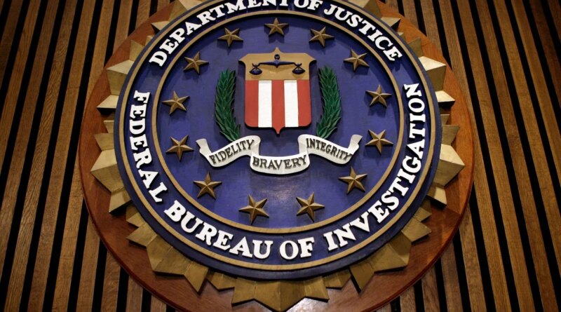 The seal of the F.B.I. hangs in the Flag Room at the bureau's headquaters March 9, 2007 in Washington, DC.