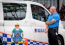 A hotel security member stands beside a police van at the entrance to the Royal Pines Resort, where members of the Iranian womens football team are staying, on the Gold Coast on March 9, 2026. Australia must protect the visiting Iranian women's football team, the son of the nation's late shah urged March 9, warning their refusal to sing the national anthem before a match could have "dire consequences". (Photo by Patrick HAMILTON / AFP)