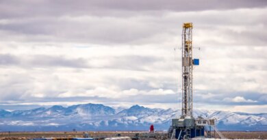 A drilling rig bores into the Earth to tap geothermal energy.