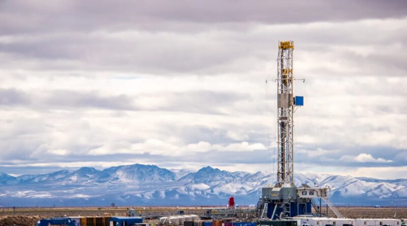 A drilling rig bores into the Earth to tap geothermal energy.