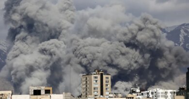 Smoke rises from the area after it was targeted in attacks as a series of explosions are heard in Tehran, Iran on March 01, 2026. The Islamic Republic of Iran Broadcasting (IRIB) building after Iranian authorities said it was targeted in the attacks.