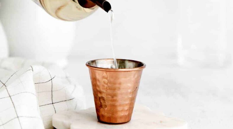 simple syrup in shot glass.