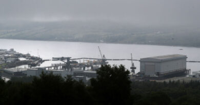 Iranian man, Romanian woman charged over attempt to enter UK submarine base